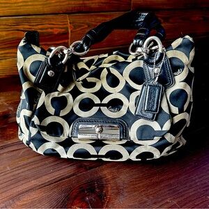 Authentic Coach signature handbag, black and gray with coral interior.